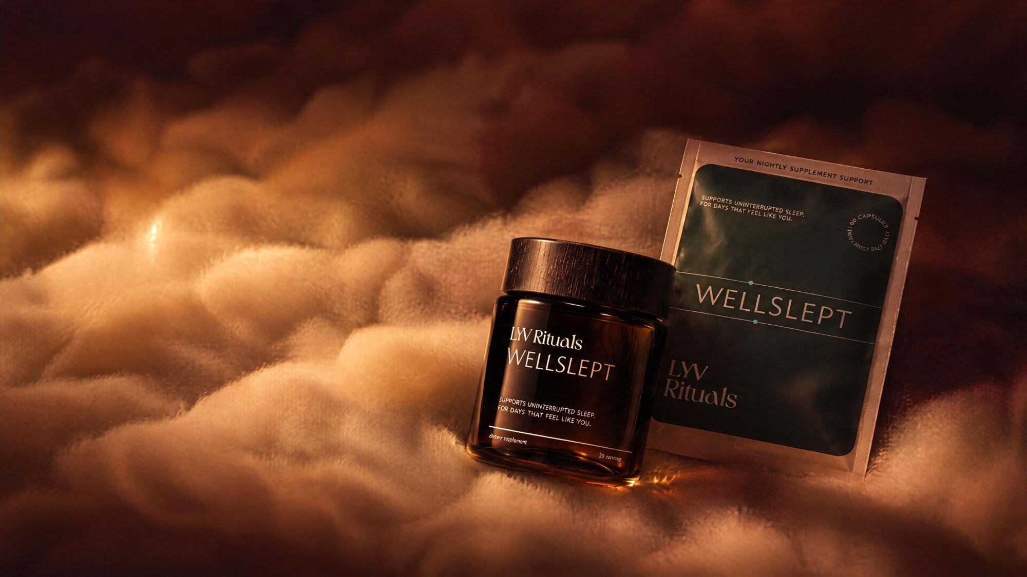WELLSLEPT jar and pouch resting on soft clouds